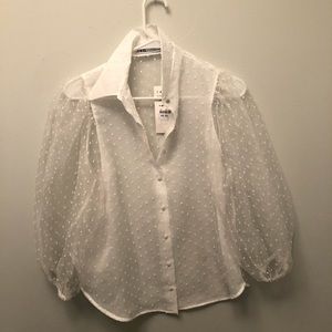 Sheer swiss dot blouse with puffy sleeves
